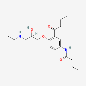 Butanamide, N-​[4-​[2-​hydroxy-​3-​[(1-​methylethyl)​amino]​propoxy]​-​3-​(1-​oxobutyl)​phenyl]​
