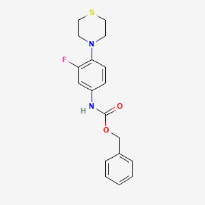 benzyl N-[3-fluoro-4-(thiomorpholin-4-yl)phenyl]carbamate